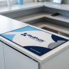 Close-up of fabric counter mat showing vivid heat-infused dye sublimation print quality